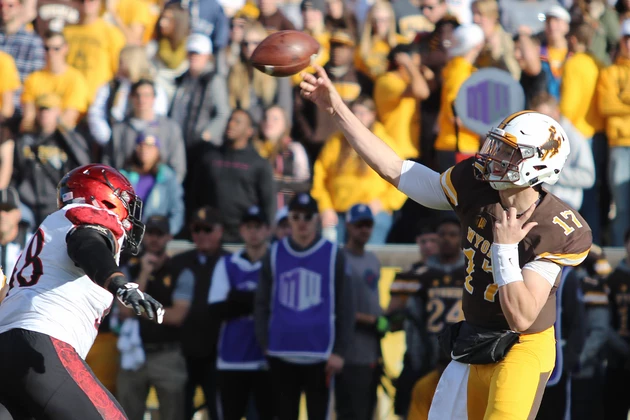 University of Wyoming Quarterback Josh Allen Throws the football.