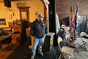 Justin Smith, Knights member and paranormal investigator, tells the story of the ghost 'V' on the Knights of Pythias stage. Credit: Phylicia Peterson, Townsquare Media SE WY